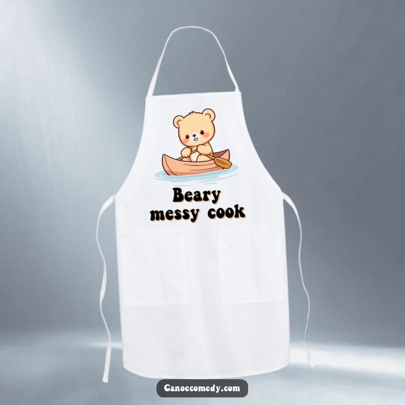 Funny Kawaii bear cub apron showing a cute bear cub balancing in a canoe, perfect for kitchen fun.