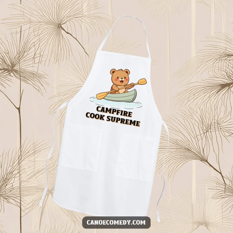 Funny apron with a cartoon bear paddling a canoe, ready for kitchen adventures, adding humor to cooking, a great funny gift.