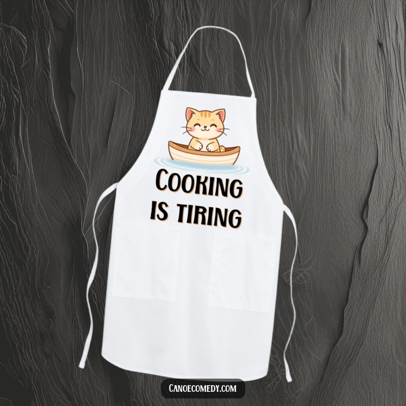 Funny Cat Floating Canoe Apron, depicting a happy cat floating peacefully in a canoe, adding humor to cooking.