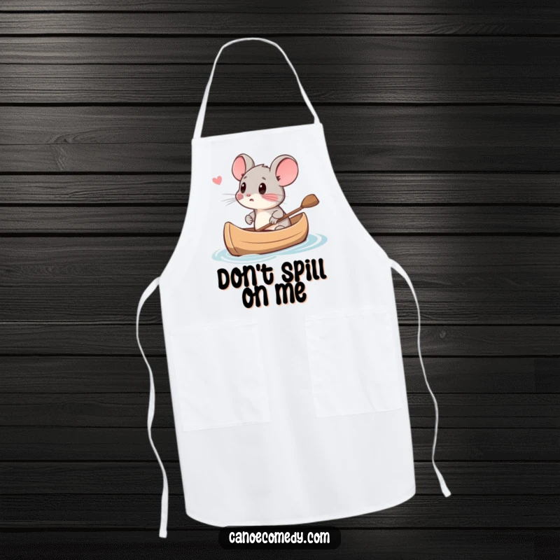Funny small mouse looking scared in a canoe while cooking, making it a humorous apron and a funny gift.