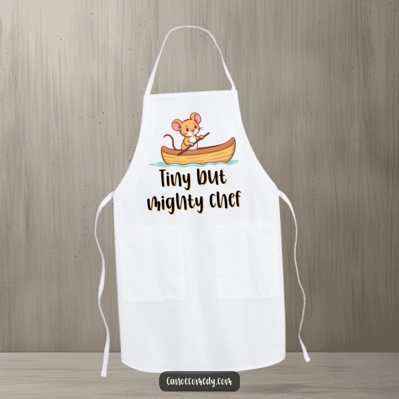 Funny apron illustration of a tiny mouse determinedly captaining a canoe, directing kitchen activities.