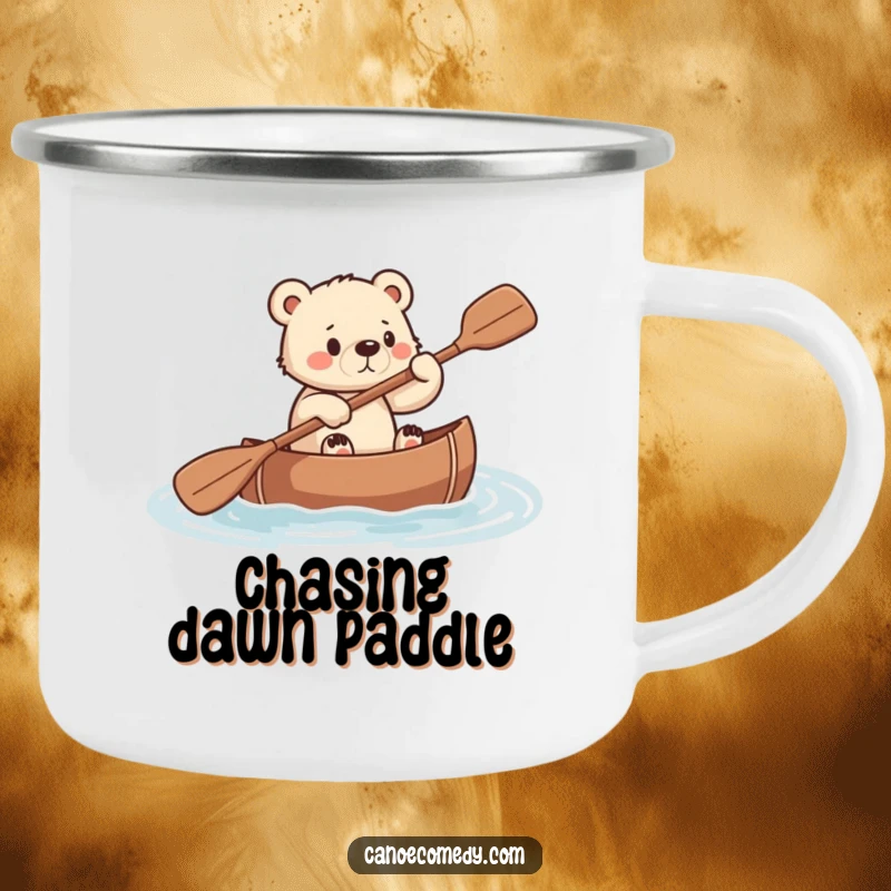 Funny camping mug showing a small bear cub paddling a canoe with serious effort and determination.