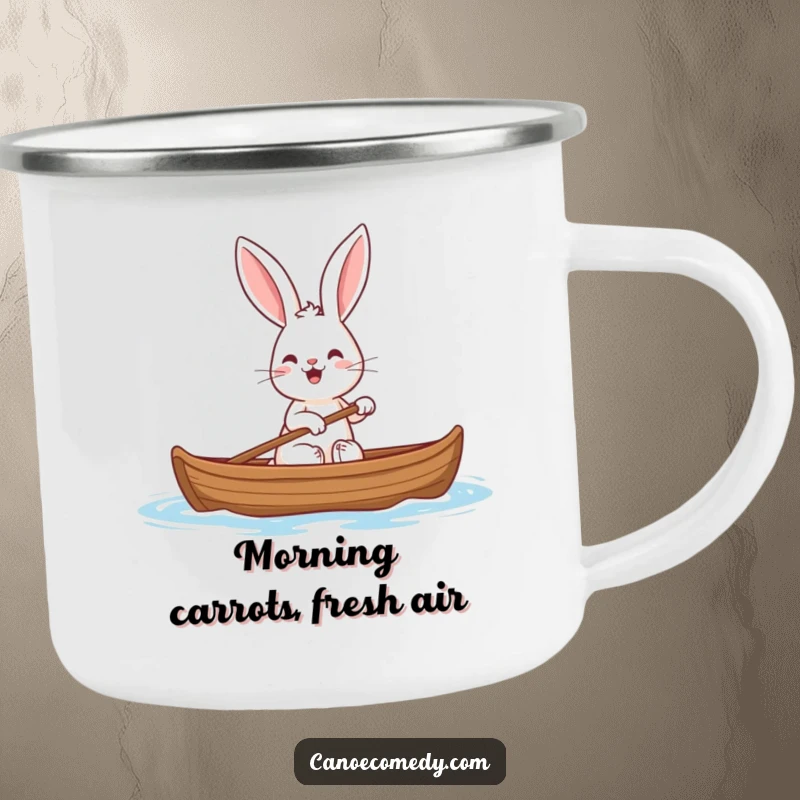 Funny enamel camping mug featuring a cheerful rabbit with big ears paddling a canoe, perfect for outdoor beverages.