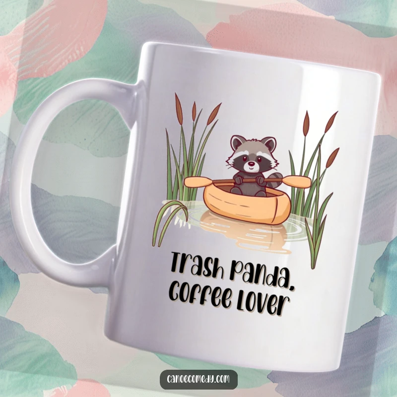 Funny raccoon mug showing a raccoon skillfully navigating a canoe through reeds with a determined look.