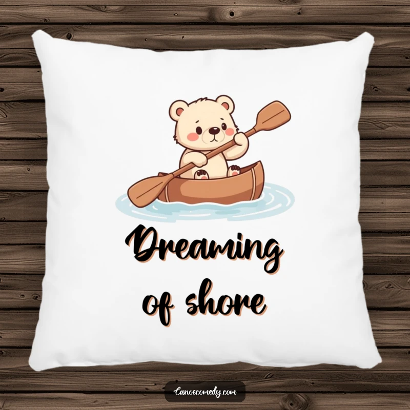 Funny, soft pillow depicting a small bear cub paddling a canoe with a look of intense determination.
