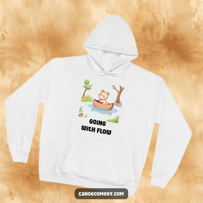 Funny hoodie depicting a happy animal giggling as its canoe drifts gently down a calm stream, embodying carefree joy.