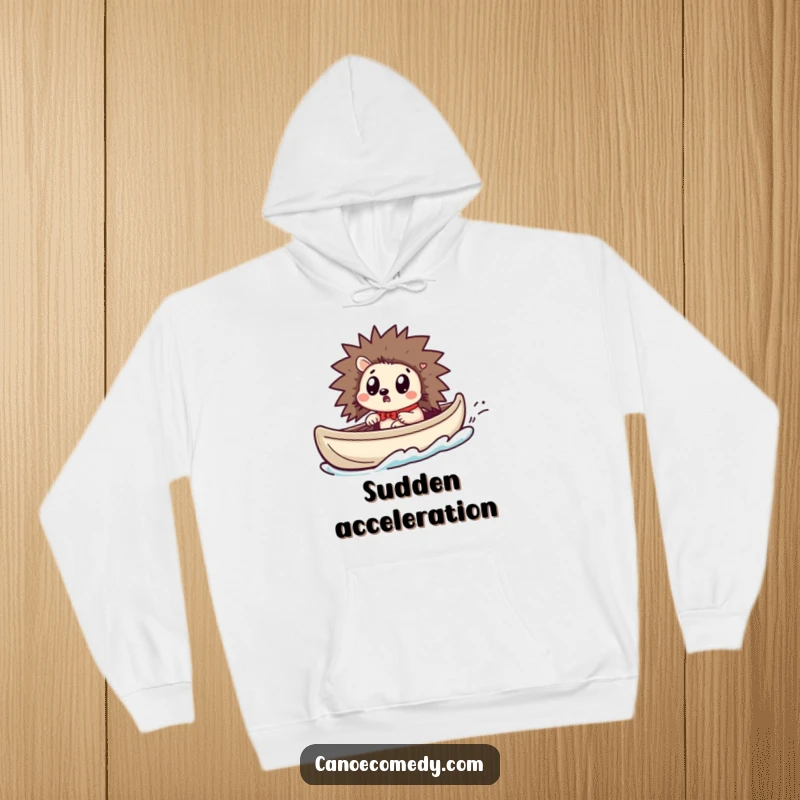 Funny Kawaii hedgehog hoodie depicting a cute hedgehog with wide eyes looking surprised as its canoe accelerates.