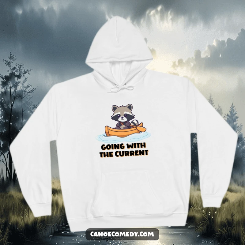 Funny kawaii raccoon in a canoe, navigating gentle waves, cozy hoodie design, cute explorer graphic.
