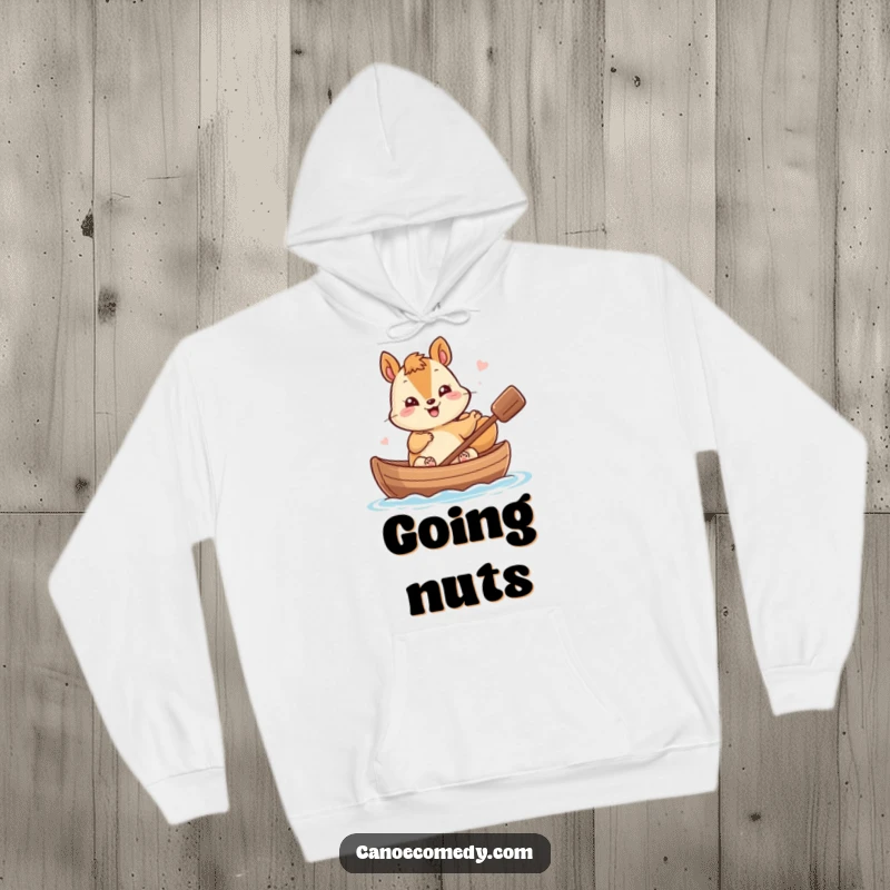 Funny Kawaii Squirrel Hoodie: Giggling squirrel waves from a nutshell canoe, offering warmth and humorous charm.