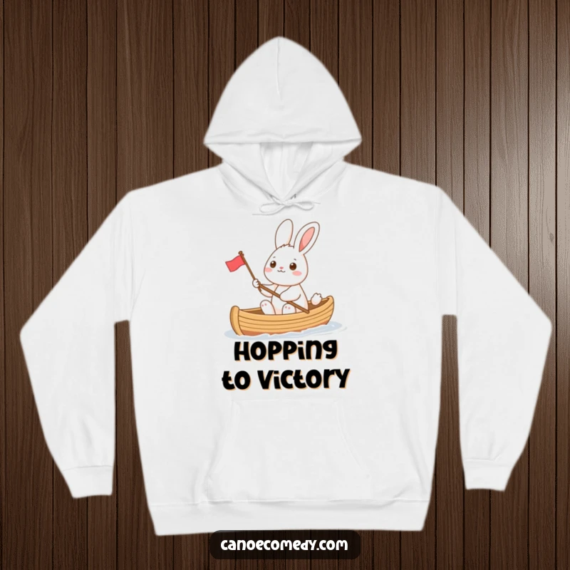 Funny rabbit in a canoe, waving a tiny flag, a warm and humorous hoodie design for spreading cheer and embracing playful journeys.