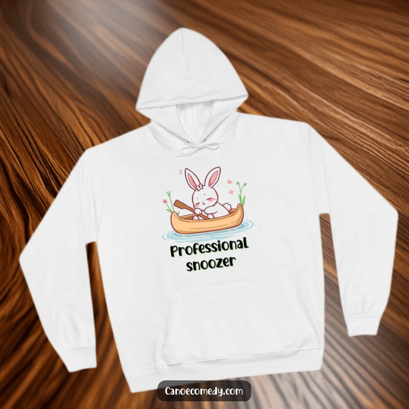 Funny hoodie with a cartoon rabbit dozing in a canoe, representing comfort and peacefulness, a wonderful funny gift.