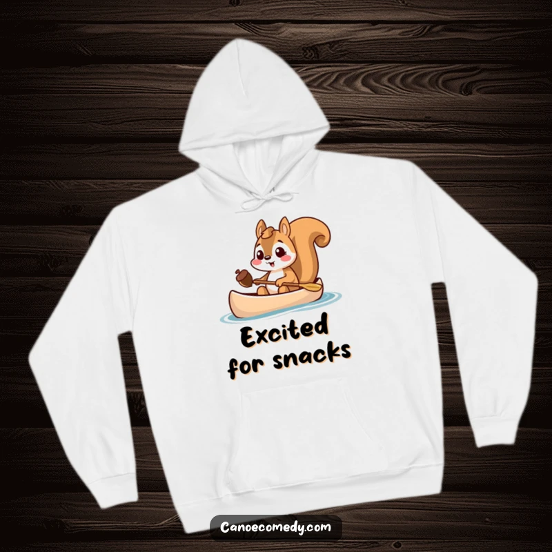 Funny squirrel holding an acorn in a canoe, cozy hoodie design, excited animal graphic.