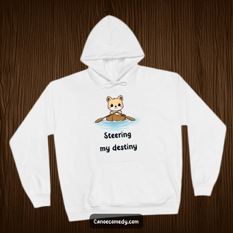 Funny hoodie featuring a steadfast animal navigating a canoe through gentle waves, conveying a sense of purpose and adventure.