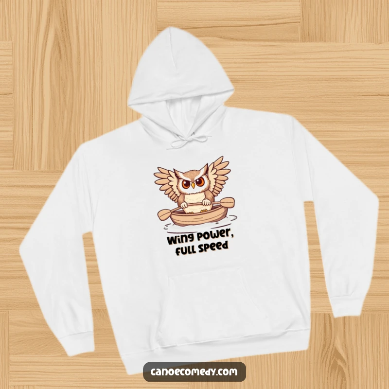Funny Owl Paddling Canoe Hoodie, illustrating a determined owl using its wings to paddle a canoe, inspiring outdoor fun.