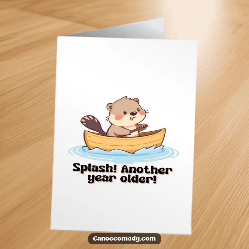 Funny Free Printable Birthday Card: Playful kawaii muskrat splashing from canoe, celebrating with watery joy.