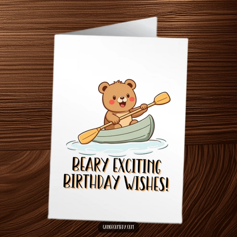 Funny Free Printable Birthday Card: Excited cartoon bear enthusiastically paddles a canoe, ready for a wild celebration.