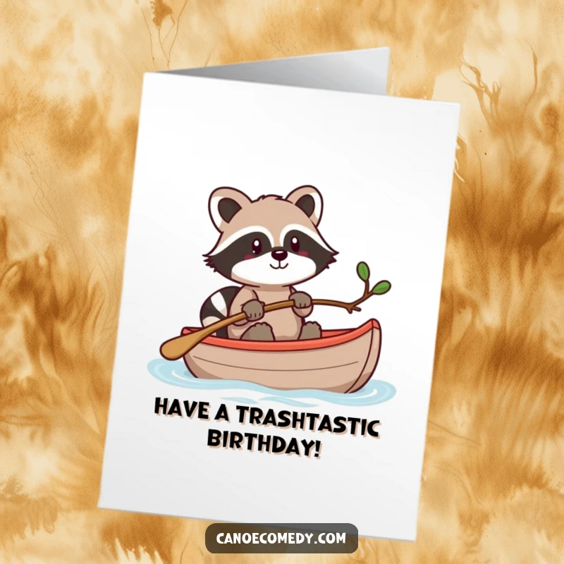 Funny Free Printable Birthday Card: Kawaii raccoon steering canoe with twig, determined, humorous, downloadable.