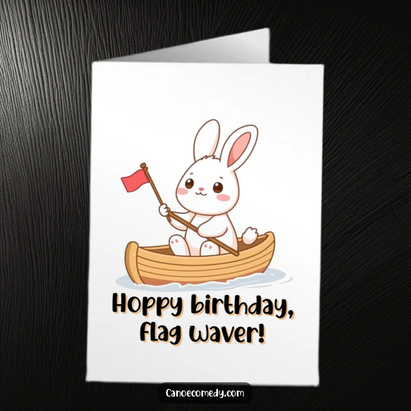 Funny Free Printable Birthday Card: Cheerful rabbit waving tiny flag from canoe, perfect DIY birthday.