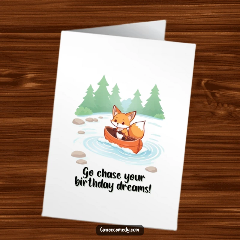 Funny Free Printable Birthday Card: Determined kawaii fox navigating a canoe through gentle rapids with focus.
