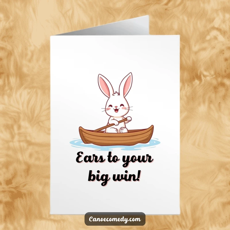 Funny Free Printable Congratulations Card: A cheerful rabbit with prominent ears joyfully paddling a canoe, ideal for a DIY congratulatory gift.