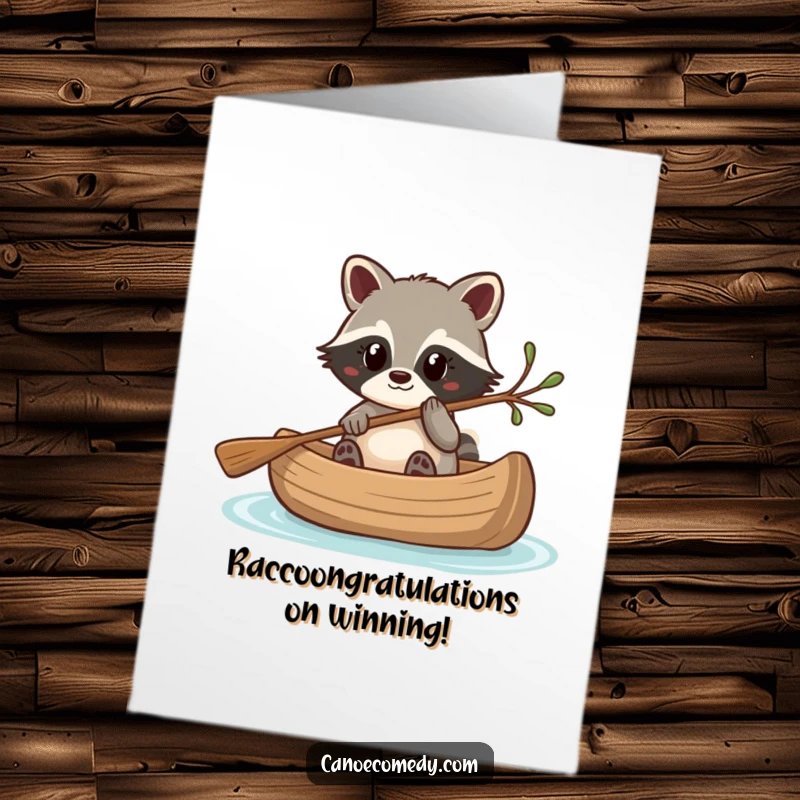 Funny Free Printable Congrats Card: Kawaii raccoon steering a canoe with a twig, representing a clever and successful adventure.