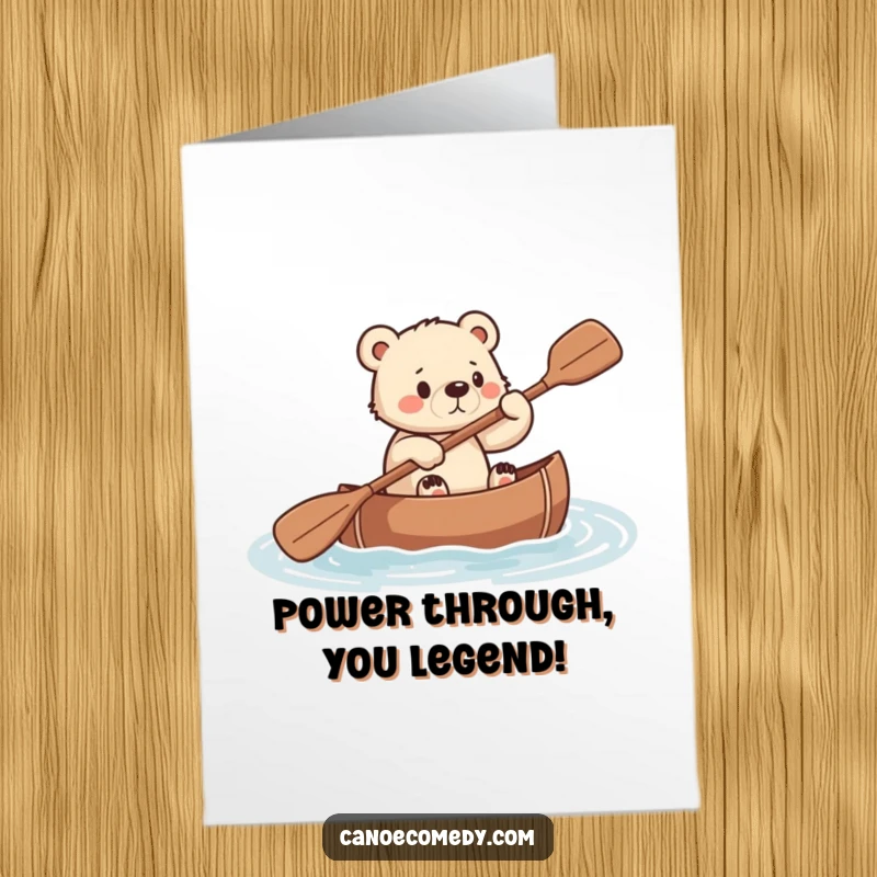 Funny Free Printable Congrats Card: A bear cub paddling vigorously in a canoe, symbolizing perseverance and victory.