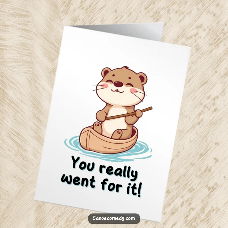 Funny Free Printable Congratulations Card: A happy otter confidently pilots a canoe with a stick, celebrating your well-deserved win.