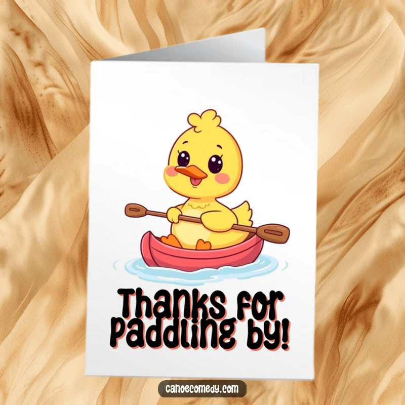 Funny free printable thank you card with a kawaii duck character paddling a tiny canoe, smiling gratefully.