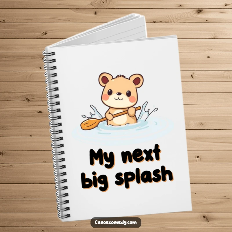 Funny notebook cover showing an animal joyfully splashing water with a paddle in a serene river, inspiring playful thoughts.