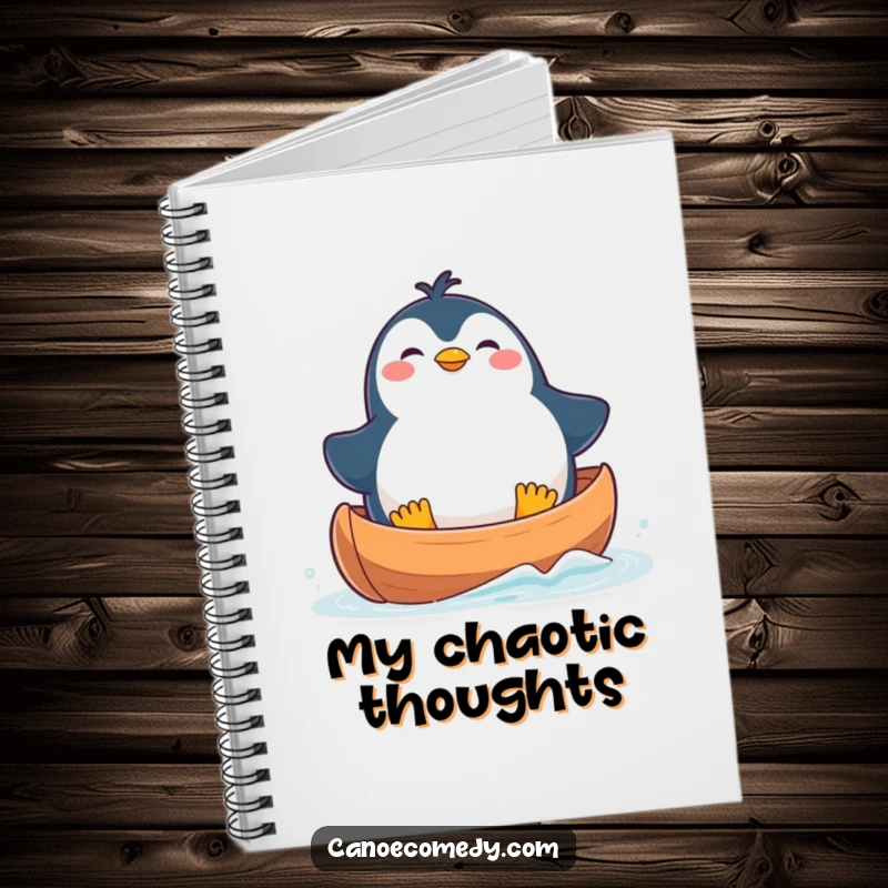 Funny Notebook with a plump kawaii penguin in a canoe, looking comically off-balance but happy, ready for writing.