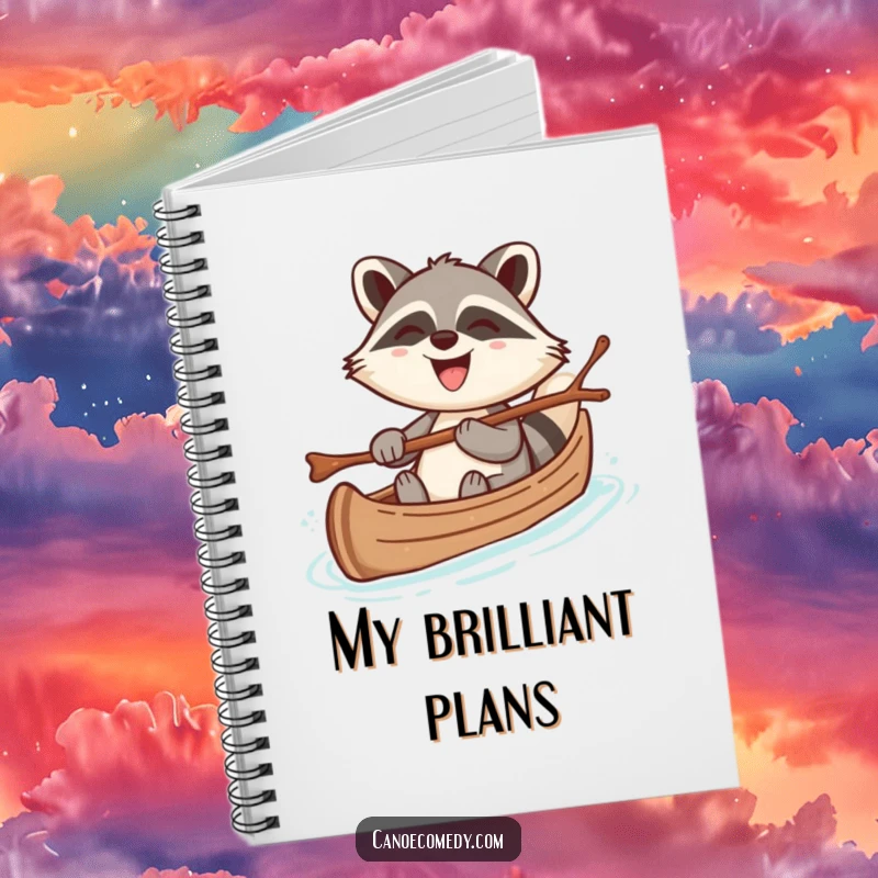 Funny notebook featuring a cheerful kawaii raccoon steering a canoe with a twig, grinning broadly, ideal for humorous writing.