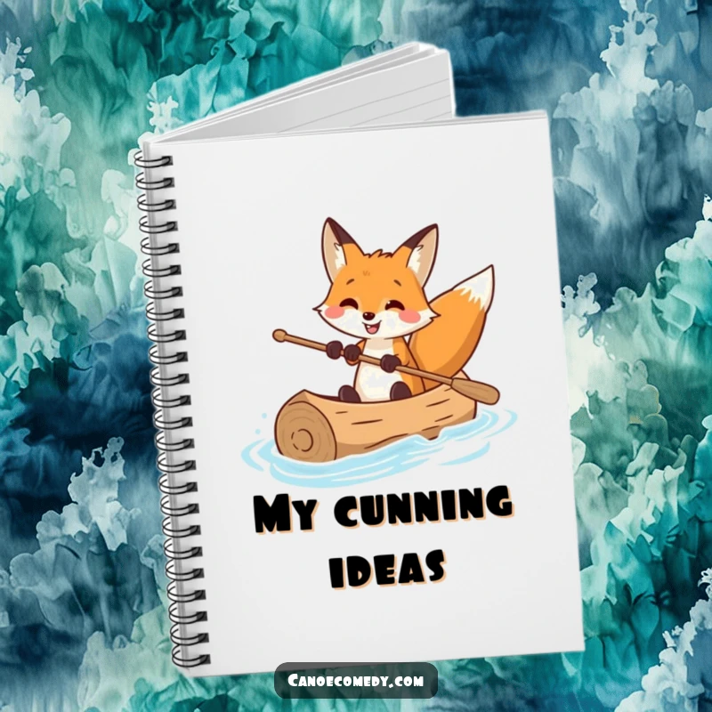 Funny notebook with a smiling fox expertly navigating a canoe, ideal for jotting down plans with a touch of humorous expertise.