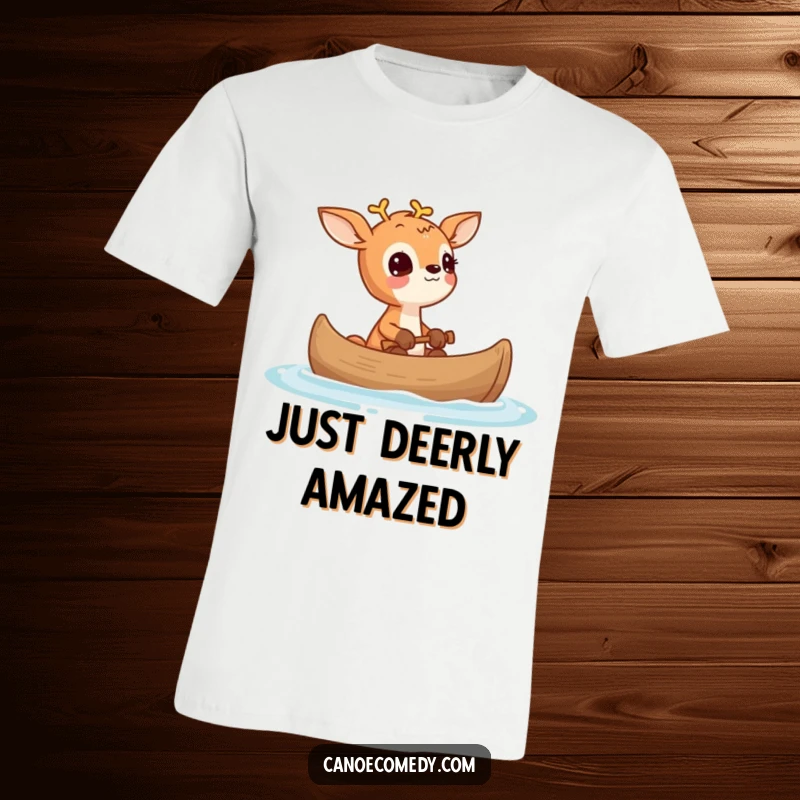 Funny Deer Wonder Canoe T-Shirt, depicting a small deer looking upwards with wonder while in a canoe, ready for adventure.