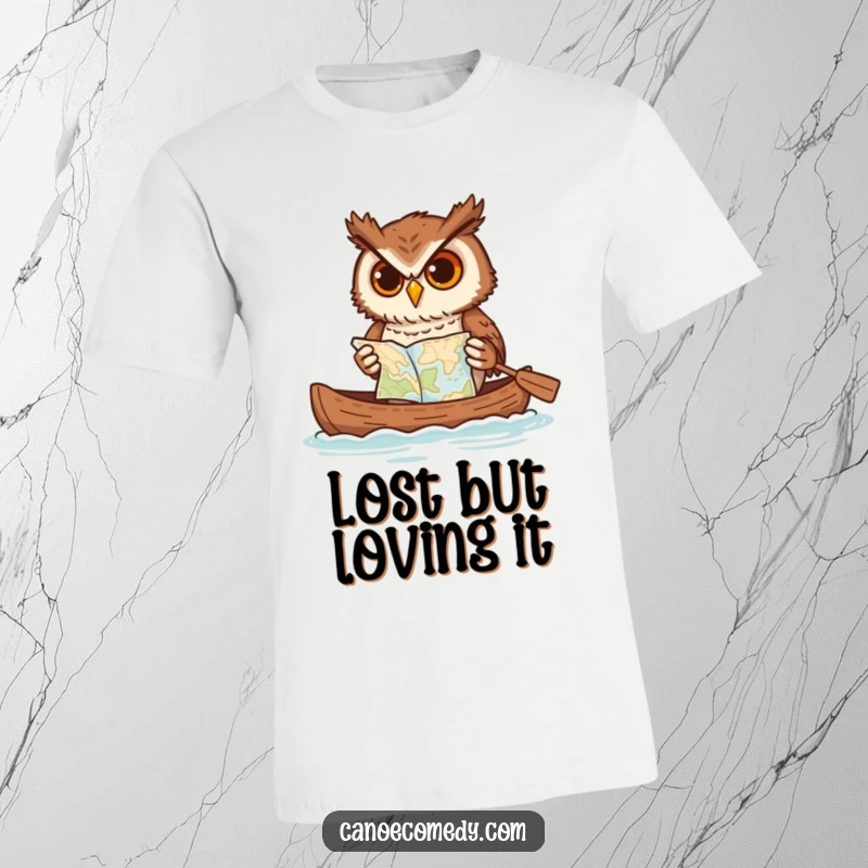 Funny owl t-shirt, determinedly paddling a canoe while precariously balancing a map, a humorous depiction of adventure.