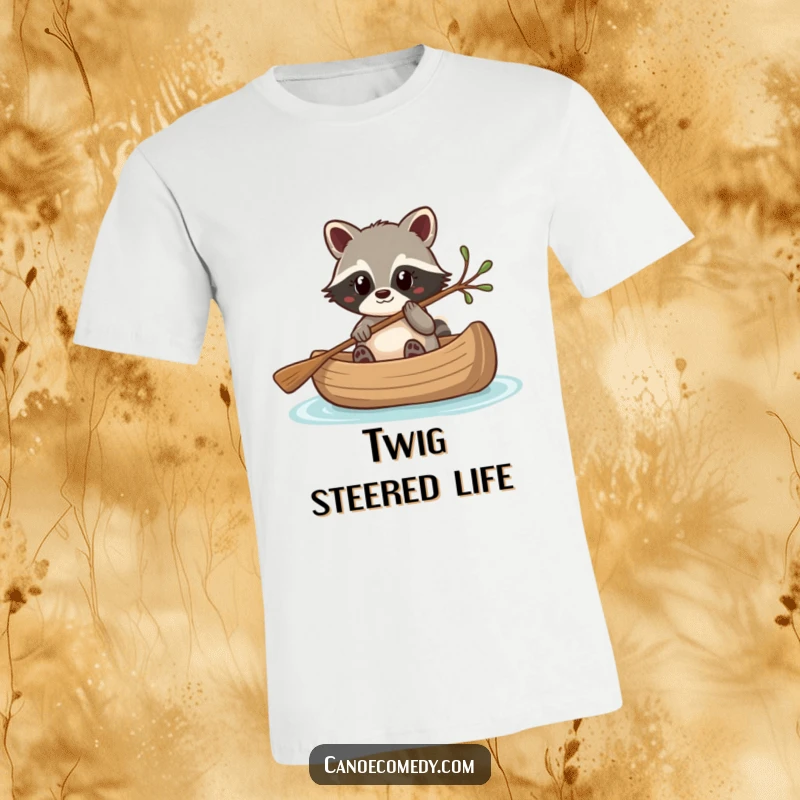 Funny Kawaii raccoon navigating a canoe with a twig, a witty and humorous t-shirt.