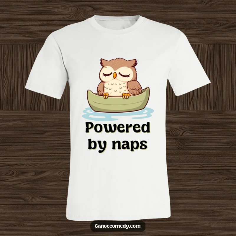 Funny owl t-shirt, peacefully dozing in a canoe with a serene expression, a symbol of ultimate relaxation and comfort.