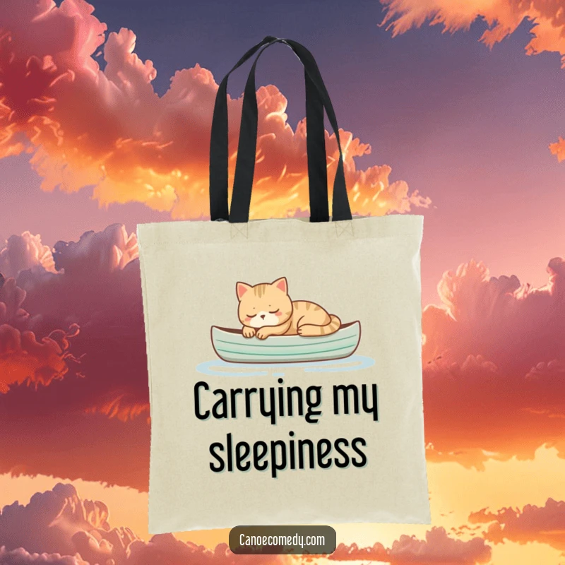 Funny cat sleeping peacefully in a small canoe, a humorous and practical tote bag for carrying essentials with calm.