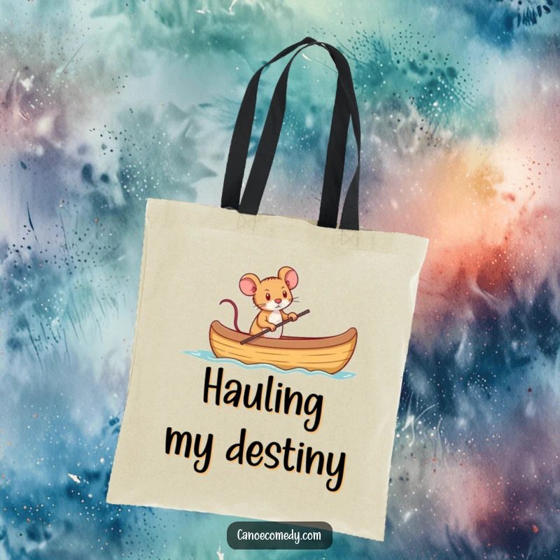 Funny tote bag design with a tiny, determined mouse bravely captaining a large canoe.