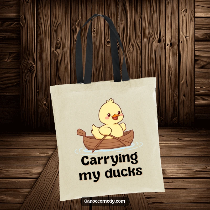Adorable Kawaii duck in a tiny canoe paddling happily, featured on a sturdy and humorous tote bag.