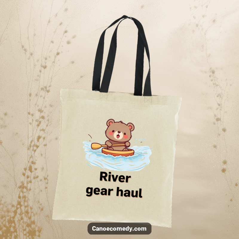 Funny bear tote bag with a design of a bear joyfully paddling a canoe down a flowing river, perfect for errands.